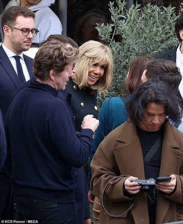 1712149422 411 Lily Collins is joined by French first lady Brigitte Macron to