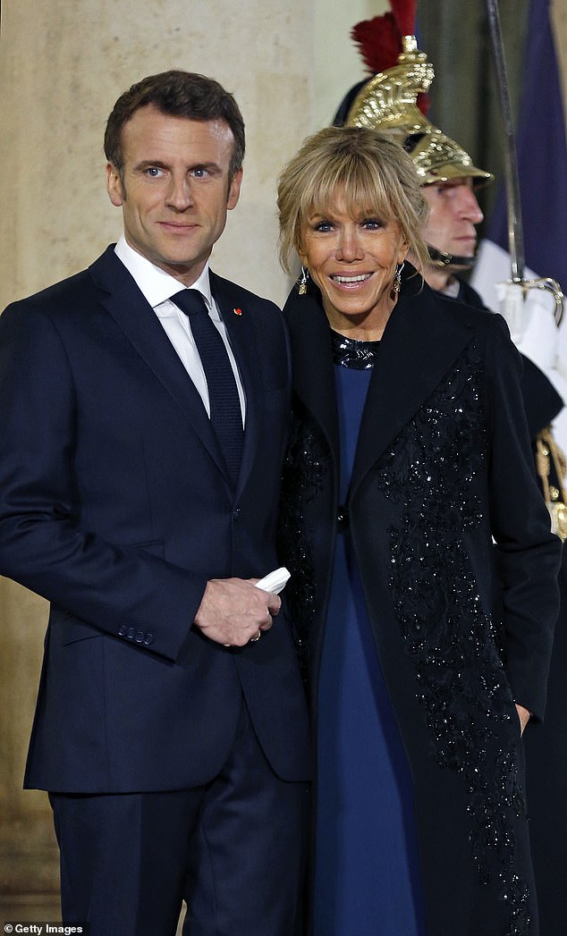 French President Emmanuel Macron photographed with his wife Brigitte in 2022