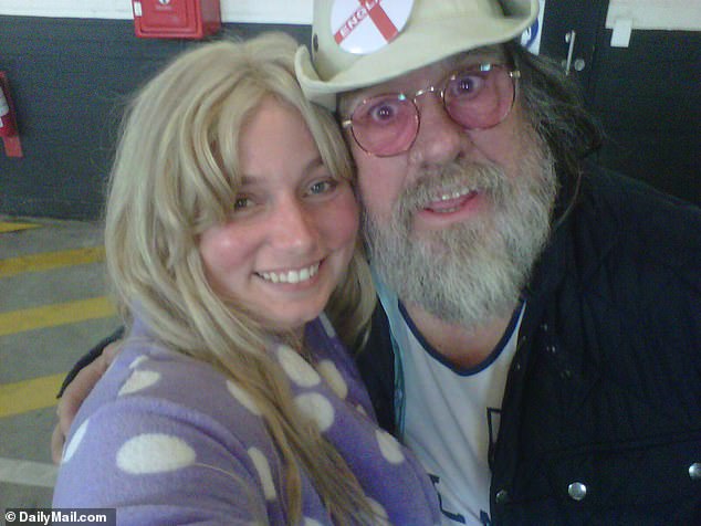 Le Roux is pictured with actor Ricky Tomlinson. She tells DailyMail.com that she was told to sit astride a woman wearing nothing but underwear and a British flag.