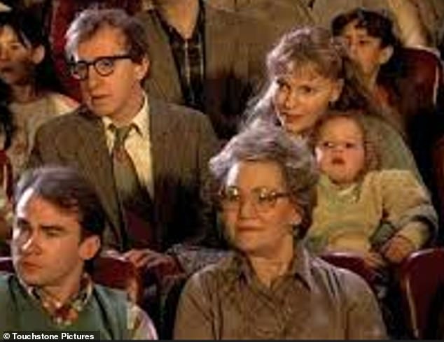 Dunst appears at age six on Mia Farrow's lap, making her film debut in the Allen (center) segment of the 1989 anthology film New York Stories.