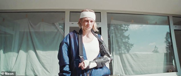 She is then seen leaving with a bandage on her head and a huge hinged brace on her arm, looking quite distraught.