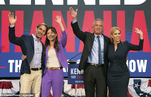 Nicole Shanahan (center left) and her current partner Jacob Strumwasser (left) at the announcement last week in her hometown of Oakland, California, that she would be (center right) Robert F. Kennedy's running mate.  Kennedy poses with his wife, actress Cheryl Hines (right)