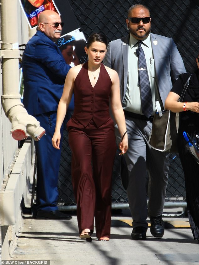 The actress stepped out in an elegant sleeveless maroon vest, with a gold necklace hanging around her neck.