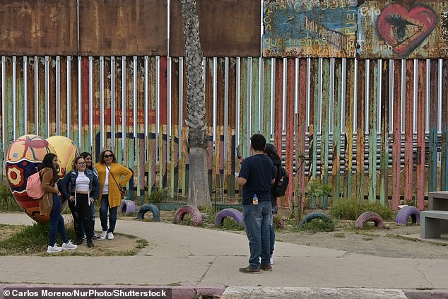 Pictured above: A look at the previous border wall at Friendship Park before it was replaced by a taller, anti-climb wall.