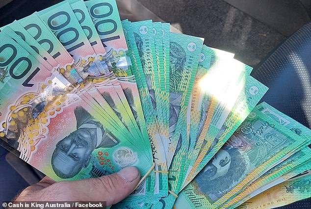 Dozens of customers flaunted the cash they withdrew from ATMs in social media posts (pictured)