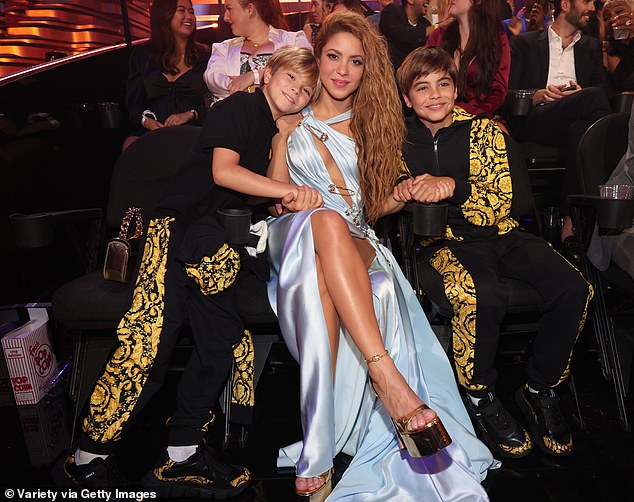 Shakira's romance comes as she fueled controversy by revealing that her children Sasha and Milan (pictured) 'hated' the 'emasculating' Barbie movie.