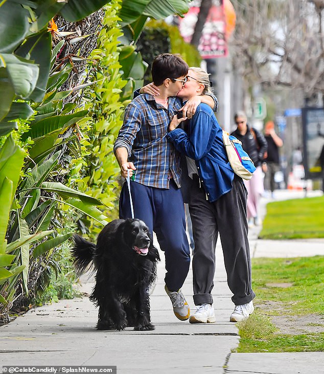 After grabbing milkshakes at the Los Angeles-based supermarket chain, frequented by celebrities including Kaia Gerber, Jake Gyllenhaal and Miley Cyrus, the couple, who married last year, were seen passionately kissing on the sidewalk while walking their dog .