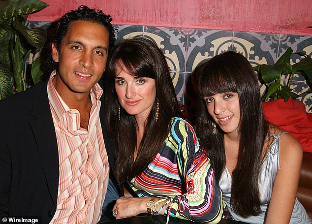 The Real Housewives of Beverly Hills star, 55, gave birth to Farrah, 35, when she was 19 before marrying Mauricio Umansky (seen with Kyle and Farrah in 2004).