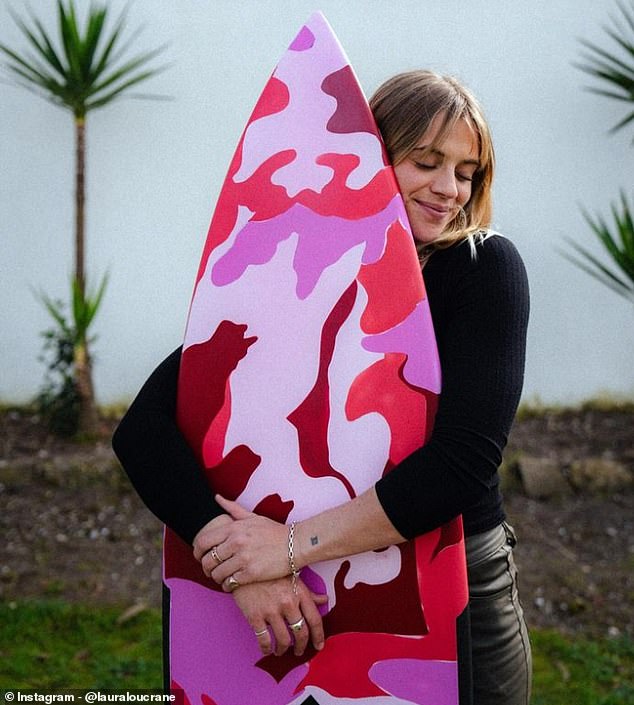 Laura took the illness as her body physically rejecting her new life in London as a TV personality, and returned to surfing (pictured in March).