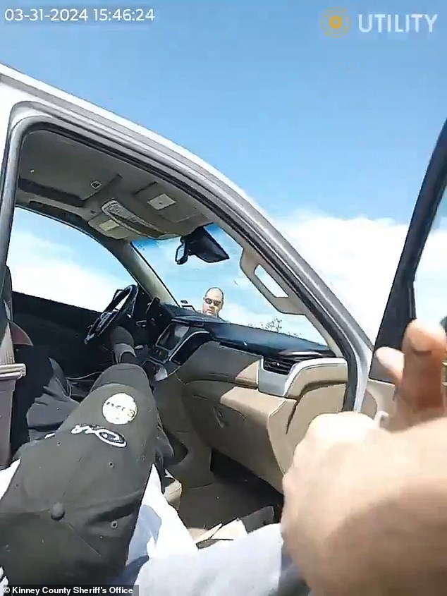 Dramatic body camera and dash camera footage showed Johnson being pulled from his silver GMC SUV after it was eventually stopped by road spikes.