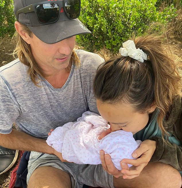 Gaut traveled to Austin, Texas, to meet newborn Ana Rose, but bringing her back to Australia didn't go as planned.  She appears in the photo with Mrs. Pavlov and Ana.