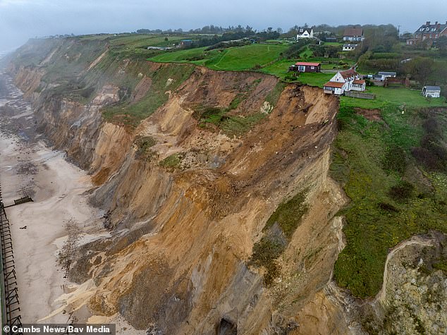 Incredible footage shows house teetering on cliff edge in Norfolk
