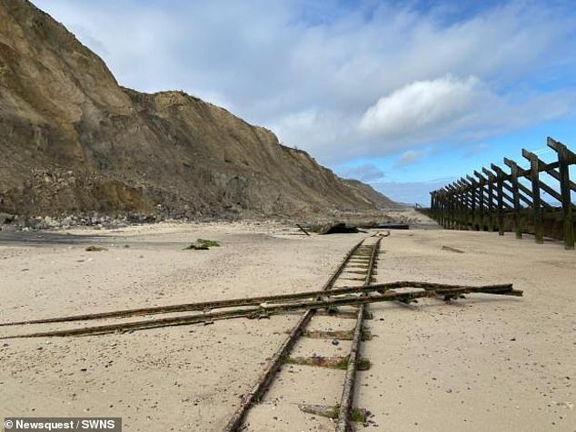 North Norfolk District Council said it has been in contact with the owners of both properties in Trimingham since the cliff fall last week.