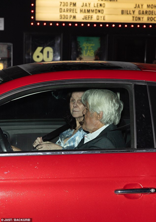 The couple, dressed in casual clothes, left in Jay's red sports car.