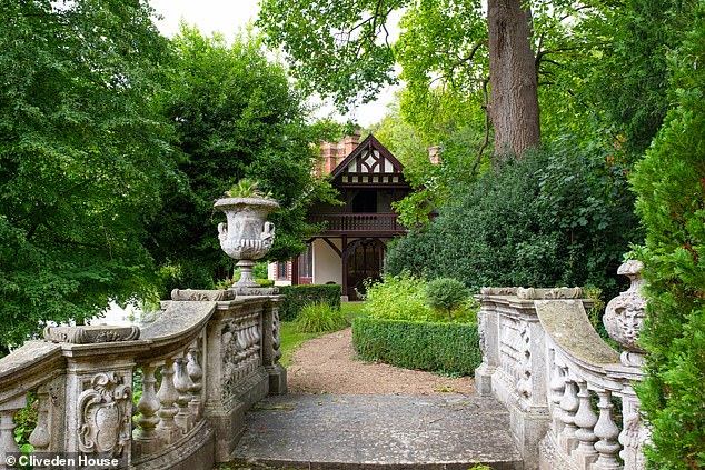 Spring Cottage in Cliveden, Berkshire, is set among carpets of primroses and daffodils in a National Trust woodland