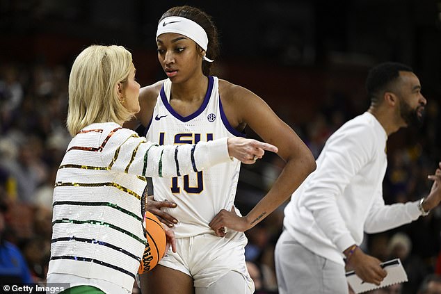 LSU Lady Tigers head coach Kim Mulkey talks with Angel Reese during the SEC tournament