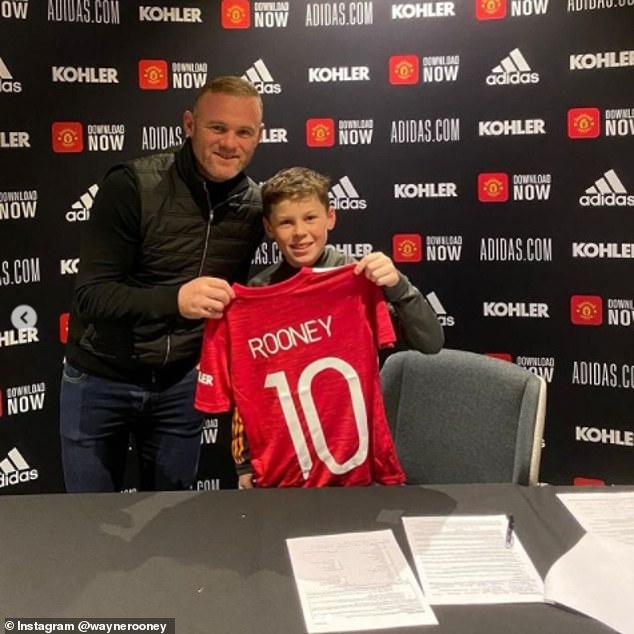 Wayne Rooney couldn't hide his pride when his son Kai signed for United's academy