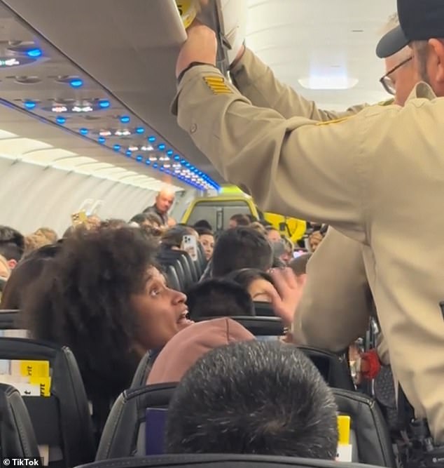 1712259573 647 Shocking moment woman melts down on Spirit Airlines flight and