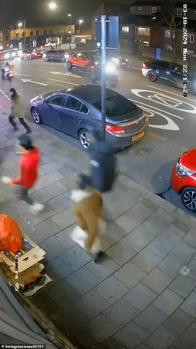 CCTV footage shows people fleeing before being followed by the huge gray XL thug.