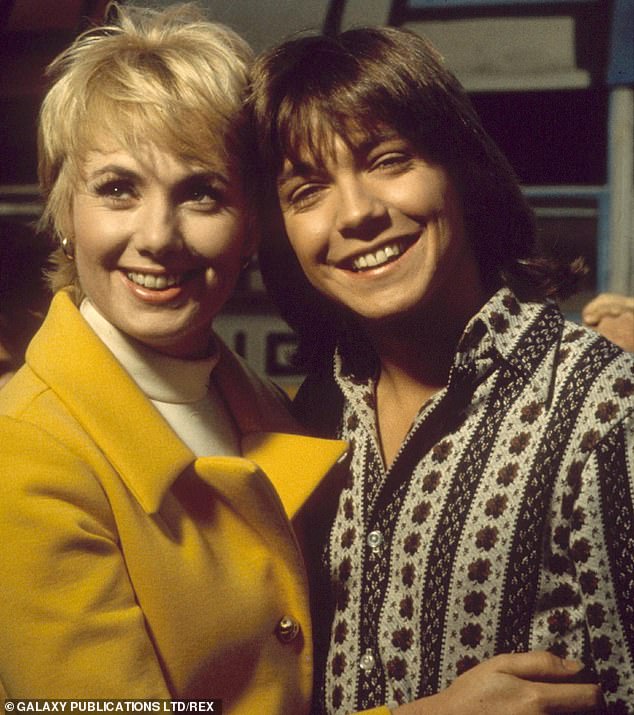 One of her children on The Partridge Family was played by her real-life stepson, David Cassidy, who died of liver failure at age 67 in 2017;  the couple is photographed in 1972