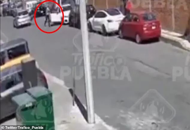 Footage of the cold-blooded crime showed a gray Hyundai pulling up next to their parked BMW before a gunman started shooting and continued shooting at them as he exited.