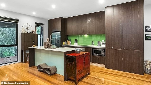 Highlights include a study, polished wood floors and a luxurious modern kitchen (pictured).