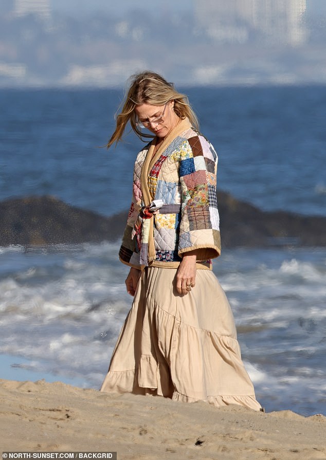 To stay warm in the ocean breeze, Jennie donned a stylish patchwork quilted jacket.