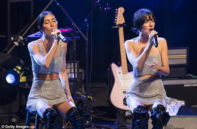 The Veronicas took a break at one point, sitting on stools to serenade their audience.