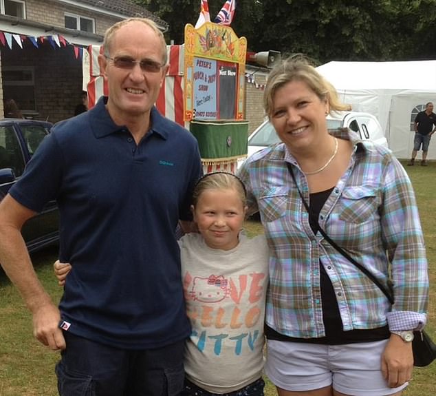 Katie (centre) with her stepfather Peter William Goodchild (left) and Katie's mother Sarah (right)