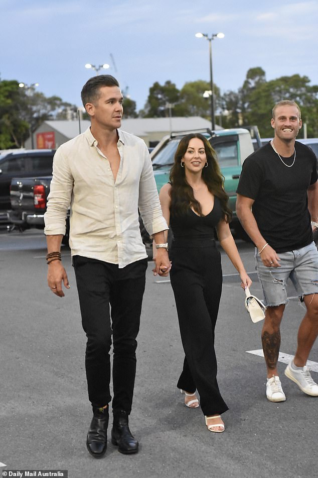 Jono, 40, and Ellie, 32, looked as in love as ever as they stepped out holding hands to catch up with their co-stars Eden Harper, Tim Calwell (right) and Mike Felix.