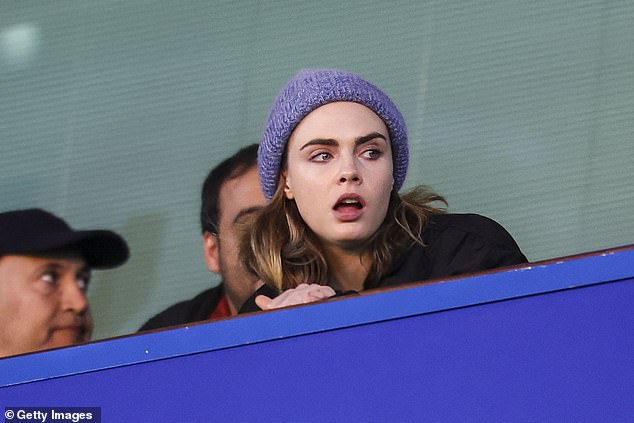 To stay warm, Cara wore a blue beanie on top of her head.