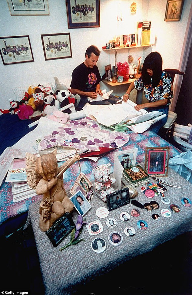 Marc Klass, father of kidnapping and murder victim Polly Klaas, and his wife Violet Cheer examine Polly's belongings in her bedroom