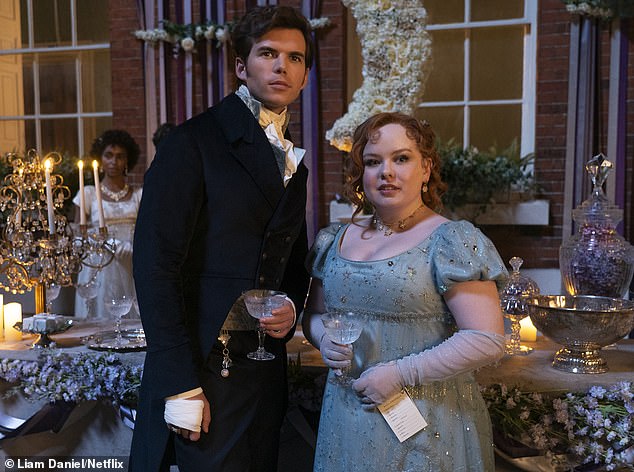 Nicola recently revealed that Bridgerton season three will be even edgier than the previous two (pictured with love interest Colin Bridgerton, played by Luke Newton).