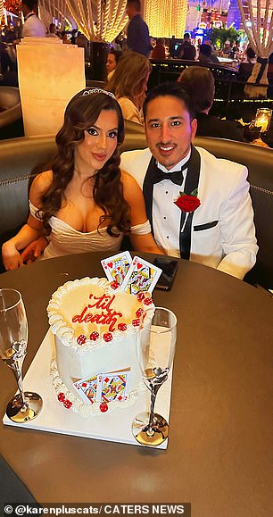 Karen and Kelvin pictured with their custom wedding cake