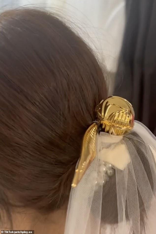 The Bangkok-based bride even made her themed headpiece, shaped like a Harry Potter snitch.