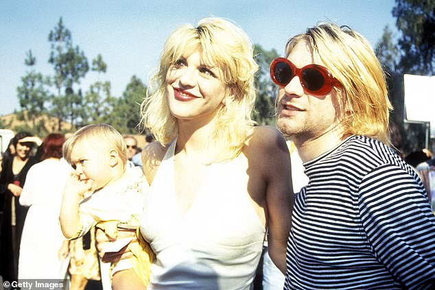 Kurt Cobain with wife Courtney Love and daughter Frances Bean at the 1993 MTV Video Music Awards in Universal City, September 2, 1993