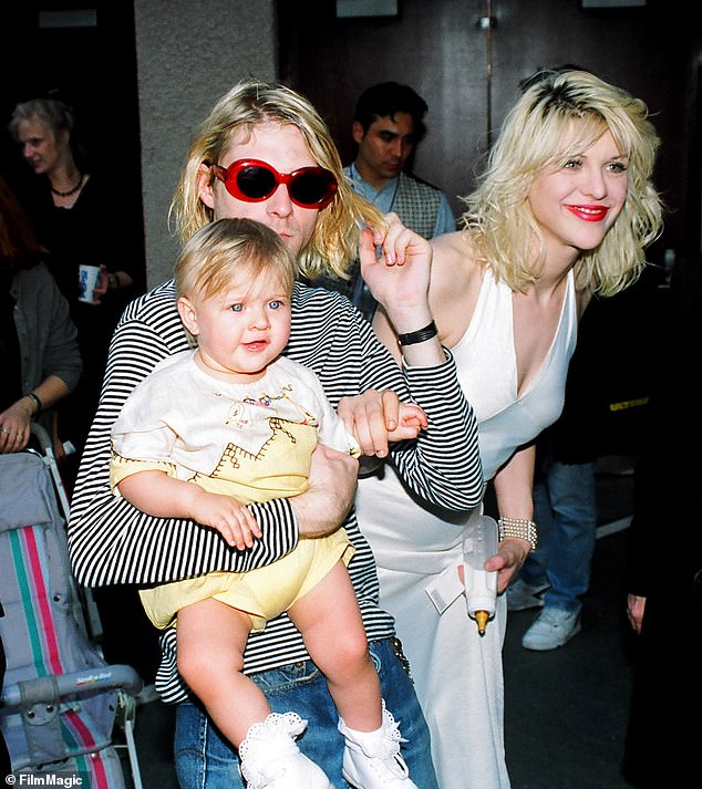 Kurt Cobain of Nirvana with his wife Courtney Love and daughter Frances Bean Cobain