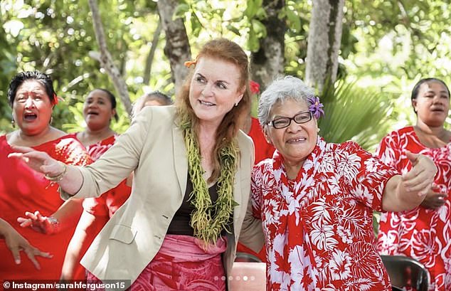 Clad in a green garland, the royal is shown meeting more islanders during her trip to Samoa.