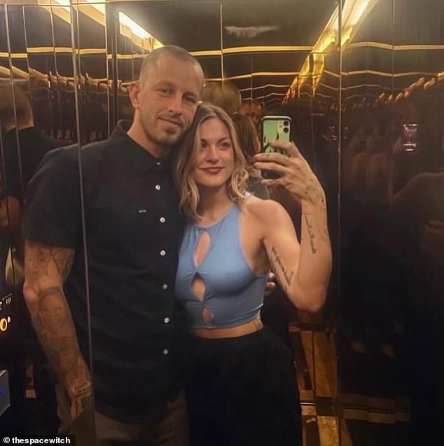With her husband of one year, professional skateboarder Riley Hawk (pictured)
