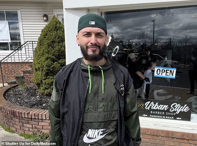 Urban Style Barbershop Steven is the one seen in the now viral images.  He is pictured outside his store in Bedminster, New Jersey.