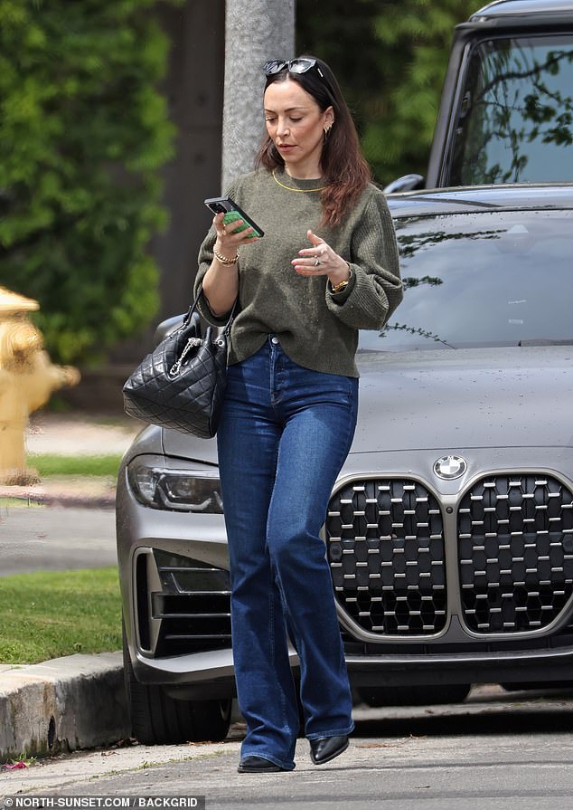 The 35-year-old daughter of the Real Housewives of Beverly Hill star wore a pair of statement rings, but not on her ring finger, when she stopped by West Hollywood to view a property.