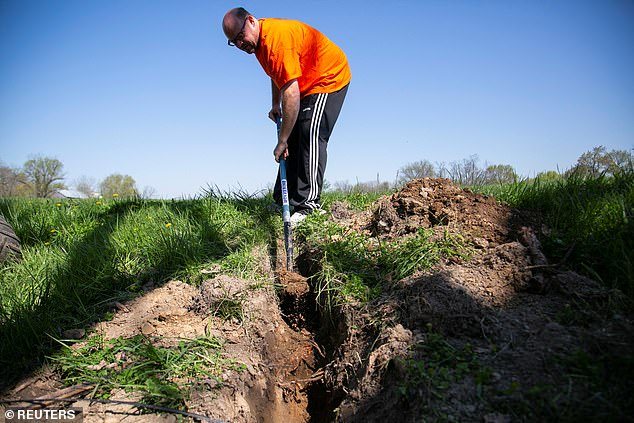 Outside Selma, Alabama, an enrollee in the program, Leon Hudson, had previously struggled to persuade Internet service providers to install broadband in his community. Above, Dave Wallace, owner of Silica Broadband, is looking for a route to run fiber cables under Louisville, Kentucky, in 2021.