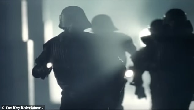 SWAT teams chase Diddy in Victory music video