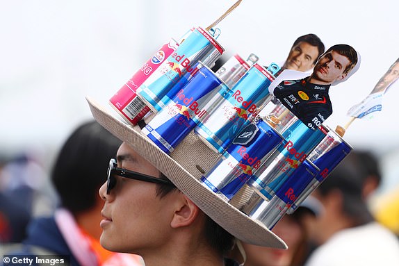 SUZUKA, JAPAN – APRIL 6: Max Verstappen of the Netherlands and Oracle Red Bull Racing show their support with a hat made from Red Bull cans before qualifying ahead of the Japanese F1 Grand Prix at the Suzuka International Racing Course on April 6. April 2024 in Suzuka, Japan. (Photo by Peter Fox/Getty Images)