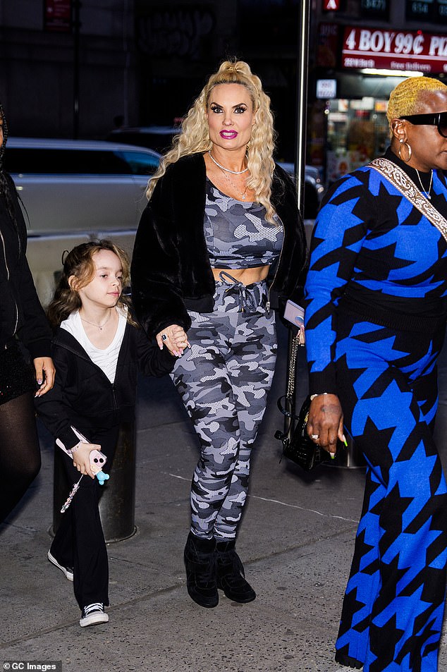 Coco Austin, wife of Ice-T, was accompanied by her 8-year-old daughter, Chanel.