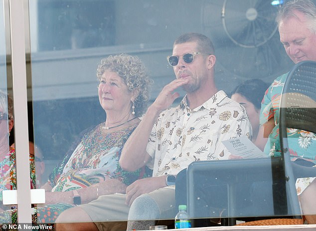 Mick Fanning (centre) is pictured with his mother Liz Osborne (left) at a tribute to Ed Fanning.