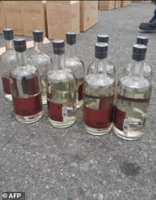 A massive shipment of liquid methamphetamine bound for Australia was found in a container loaded with 7,200 bottles of clear liquid labeled as mezcal alcohol (pictured).