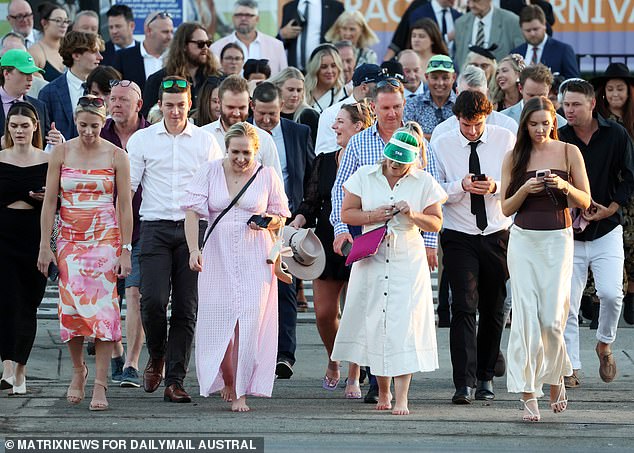 Pictured is the crowd arriving for the big day at the Royal Randwick races.