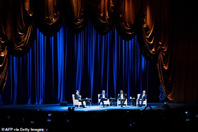Comedian Stephen Colbert (left) moderated the debate with (from left) President Joe Biden, former President Barack Obama and former President Bill Clinton.