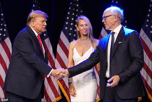 Trump with Jets owner and former ambassador to the United Kingdom Woody Johnson and his wife Suzanne after a rally in Las Vegas in February.  The Johnsons are co-chairs of the April 6 fundraiser.